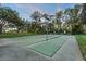 Well-maintained shuffleboard courts with lights at 1255 Paradise Way, Venice, FL 34285