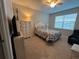 Cozy bedroom with queen-size bed and neutral decor at 128 Navigation Cir # 103, Osprey, FL 34229