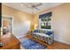 Functional bedroom with a sofa bed, closet, and a window overlooking the outdoors at 1307 Highland Greens Dr, Venice, FL 34285