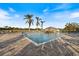 Inviting community pool with ample seating, perfect for relaxation and recreation on sunny days at 1307 Highland Greens Dr, Venice, FL 34285
