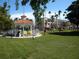 Scenic park view featuring a charming gazebo and lush green space at 1307 Highland Greens Dr, Venice, FL 34285