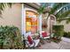 Inviting patio with comfortable seating, creating a cozy outdoor living space at 1307 Highland Greens Dr, Venice, FL 34285
