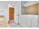 Bathroom featuring walk-in tub and built-in shelving at 1316 Laurel Ave, Venice, FL 34285