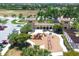 Aerial view of a community playground with play structures and shaded areas at 13389 Caravaggio Ct, Venice, FL 34293