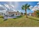 Large backyard with patio, grill, and shed at 13540 Dibella Ave, Port Charlotte, FL 33981