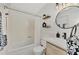 Clean bathroom with updated vanity and shower at 13540 Dibella Ave, Port Charlotte, FL 33981