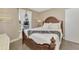 Bright bedroom featuring a wooden bed and tasteful decor at 13540 Dibella Ave, Port Charlotte, FL 33981