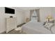 Comfortable bedroom with wicker furniture and large windows at 13540 Dibella Ave, Port Charlotte, FL 33981