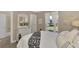 Spacious bedroom with a dresser and large window offering natural light at 13540 Dibella Ave, Port Charlotte, FL 33981