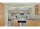 Well-equipped kitchen, granite countertops, and island at 13540 Dibella Ave, Port Charlotte, FL 33981
