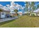 Spacious backyard patio with seating area and grill at 13540 Dibella Ave, Port Charlotte, FL 33981