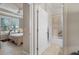 Clean bathroom with a tub and shower, and neutral tile at 13807 Karina St, Venice, FL 34293