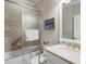 Well-appointed bathroom featuring a shower/tub combo, toilet and vanity at 13807 Karina St, Venice, FL 34293