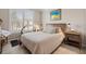 Comfortable bedroom with large window and neutral decor at 13807 Karina St, Venice, FL 34293