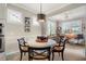 Casual breakfast nook with round table and four chairs at 13807 Karina St, Venice, FL 34293