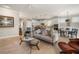 Open concept kitchen features island, stainless steel appliances, and white cabinets at 13807 Karina St, Venice, FL 34293
