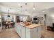 Spacious kitchen with large island, breakfast bar, and open floor plan at 13807 Karina St, Venice, FL 34293