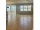 Spacious living room with tile floors, recessed lights, and abundant natural light at 13807 Karina St, Venice, FL 34293