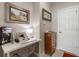 Home office with desk, chair, and storage cabinet at 13807 Karina St, Venice, FL 34293