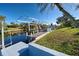 Private boat lift with covered dock and canal access at 168 Buckeye Nw Ave, Port Charlotte, FL 33952