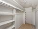 Spacious walk-in closet with ample shelving and hanging space at 1771 Gale St, Englewood, FL 34223