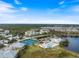 Community overview with pool and tennis courts at 2081 Willow Hammock Cir # F204, Punta Gorda, FL 33983