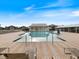 Relaxing community pool with lounge chairs at 2081 Willow Hammock Cir # F204, Punta Gorda, FL 33983