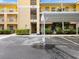 Building exterior with parking and carport at 2081 Willow Hammock Cir # F204, Punta Gorda, FL 33983