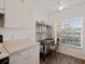 Kitchen nook with built-in shelving and window seat at 2081 Willow Hammock Cir # F204, Punta Gorda, FL 33983