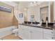Bathroom with single vanity and a tub shower combo at 2090 Piave Ln, Venice, FL 34292