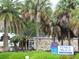 Venice Beach concessions with palm trees and signage at 2090 Piave Ln, Venice, FL 34292