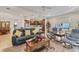 Open concept living space with comfortable seating and a view into the kitchen at 2090 Piave Ln, Venice, FL 34292