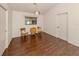 Bright dining area with wood flooring and a window at 222 Woodingham Pl, Venice, FL 34292