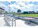 Seating area with a view of the baseball field and scoreboard at 24076 Spartina Dr, Venice, FL 34293