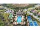 Resort-style pool, tennis courts, and bocce ball in community at 287 Cassano Dr, Nokomis, FL 34275