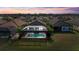 Aerial view of house with private pool and surrounding homes at 287 Cassano Dr, Nokomis, FL 34275