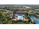 Community pool and amenities surrounded by homes at 287 Cassano Dr, Nokomis, FL 34275