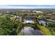 Community pool, tennis courts and clubhouse at 287 Cassano Dr, Nokomis, FL 34275