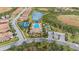 Community pool, tennis courts, and surrounding neighborhood at 287 Cassano Dr, Nokomis, FL 34275