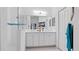 Double vanity bathroom with a large walk-in shower at 287 Cassano Dr, Nokomis, FL 34275