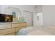 Guest bedroom with coastal decor and plenty of storage at 287 Cassano Dr, Nokomis, FL 34275