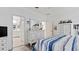 Bright bedroom with ensuite bathroom access and walk-in closet at 287 Cassano Dr, Nokomis, FL 34275