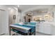 Kitchen features a large island with seating and white cabinetry at 287 Cassano Dr, Nokomis, FL 34275