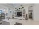 Living area with white built-ins and a large TV at 287 Cassano Dr, Nokomis, FL 34275