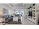 Open living room, kitchen and view of pool at 287 Cassano Dr, Nokomis, FL 34275