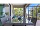 Outdoor patio with glass-top table and seating at 287 Cassano Dr, Nokomis, FL 34275