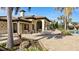 Resort-style pool with patio tables and lounge chairs at 287 Cassano Dr, Nokomis, FL 34275