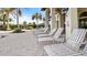 Relaxing poolside loungers ready for your enjoyment at 287 Cassano Dr, Nokomis, FL 34275