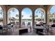 Covered patio area overlooking the community pool at 287 Cassano Dr, Nokomis, FL 34275