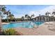 Large community pool with plenty of lounge chairs at 287 Cassano Dr, Nokomis, FL 34275